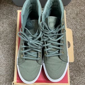 Vans with gold eyelets